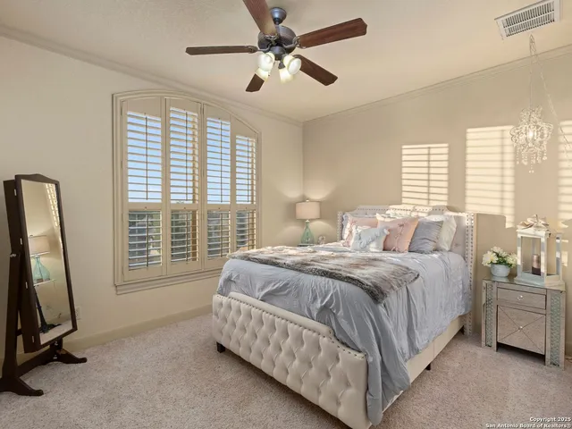 a view of a porch with furniture and a yard