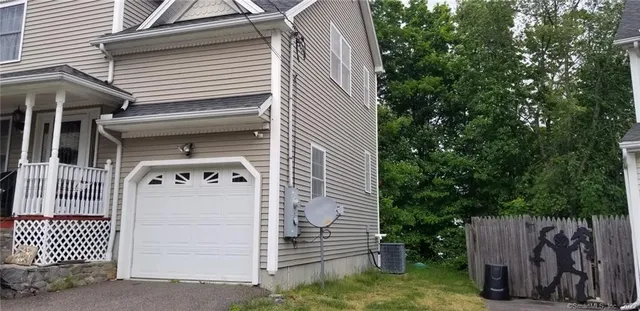 a white house with a outdoor space