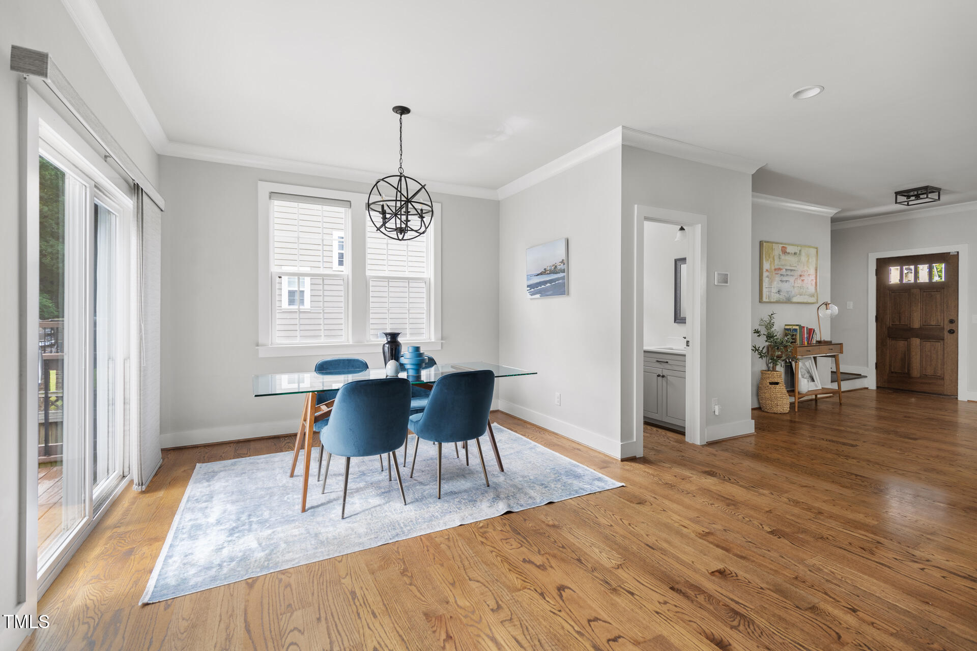 2929 Chapel Hill Road Durham, NC 27707 - Photo 21 of 38 a view of a dining room with furniture window and wooden floor