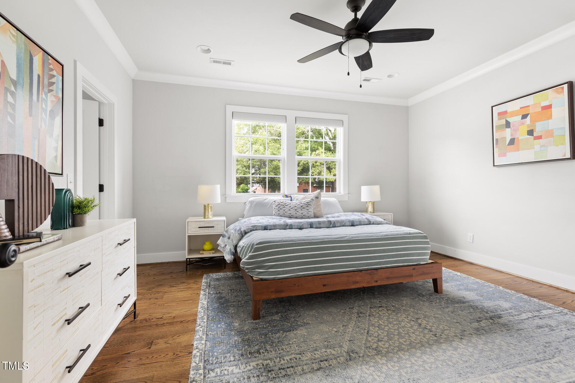 2929 Chapel Hill Road Durham, NC 27707 - Photo 23 of 38 a spacious bedroom with a bed and a window