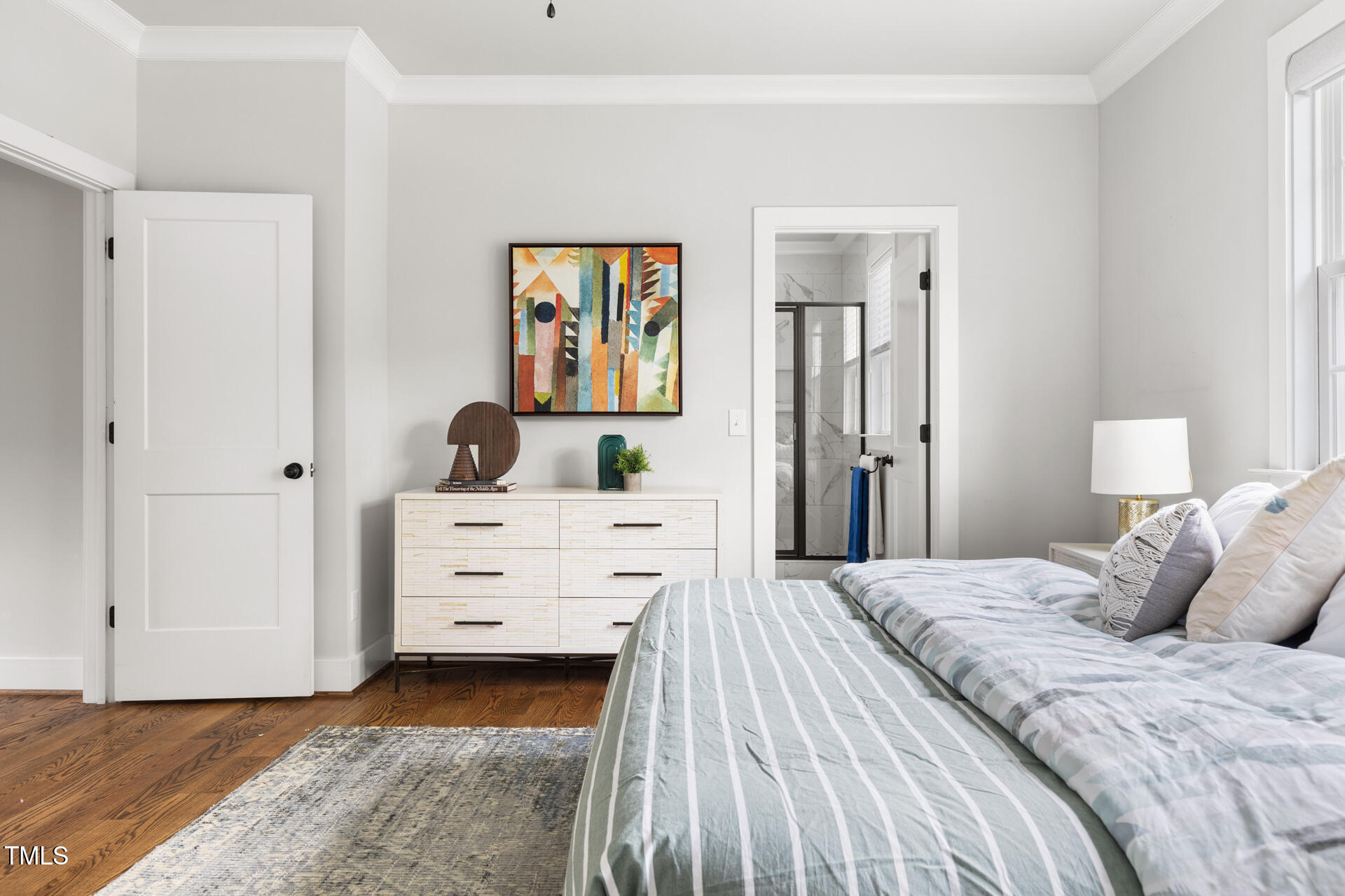 2929 Chapel Hill Road Durham, NC 27707 - Photo 25 of 38 a bedroom with a bed and a dresser