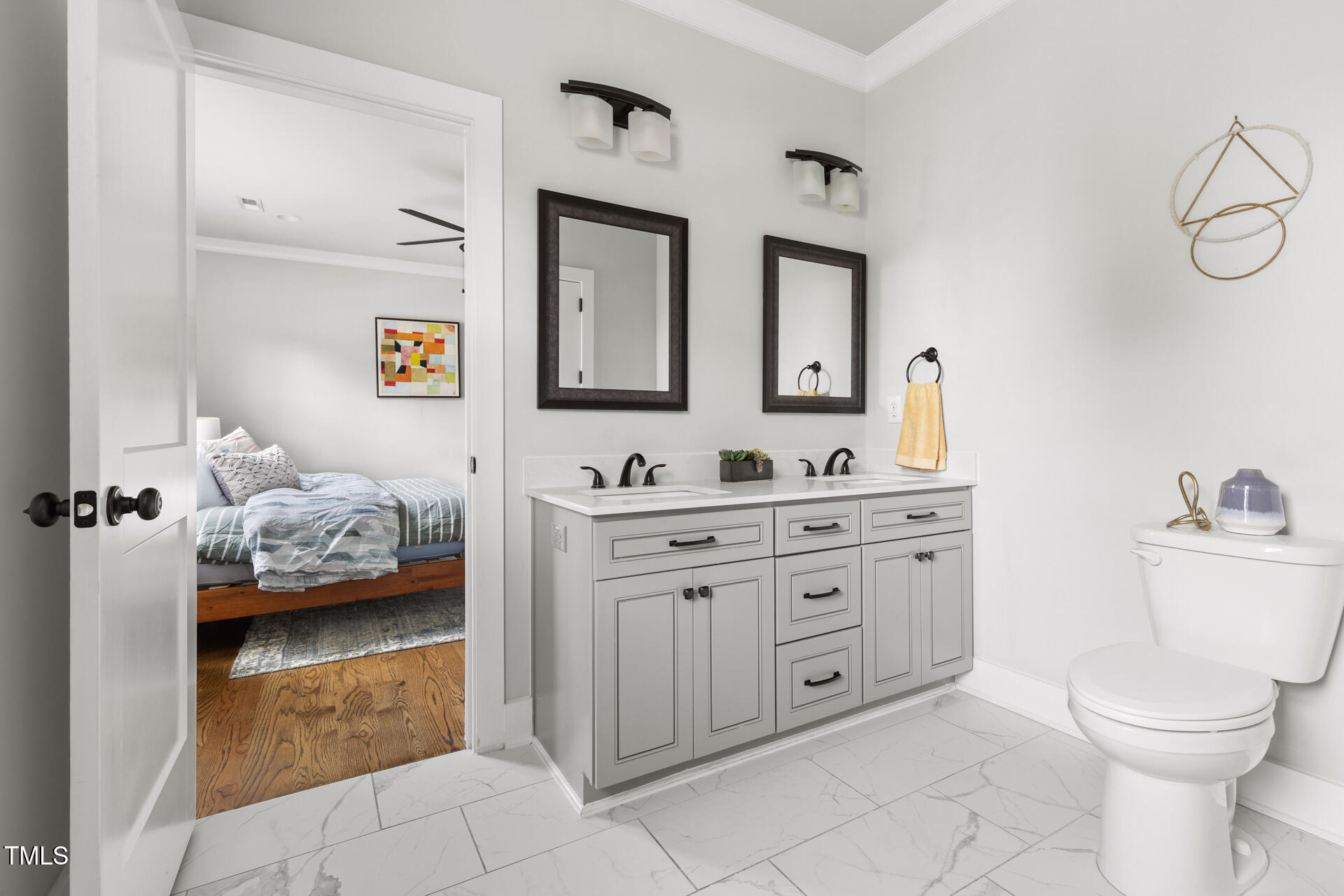 2929 Chapel Hill Road Durham, NC 27707 - Photo 28 of 38 a en suite bathroom with a toilet sink and mirror