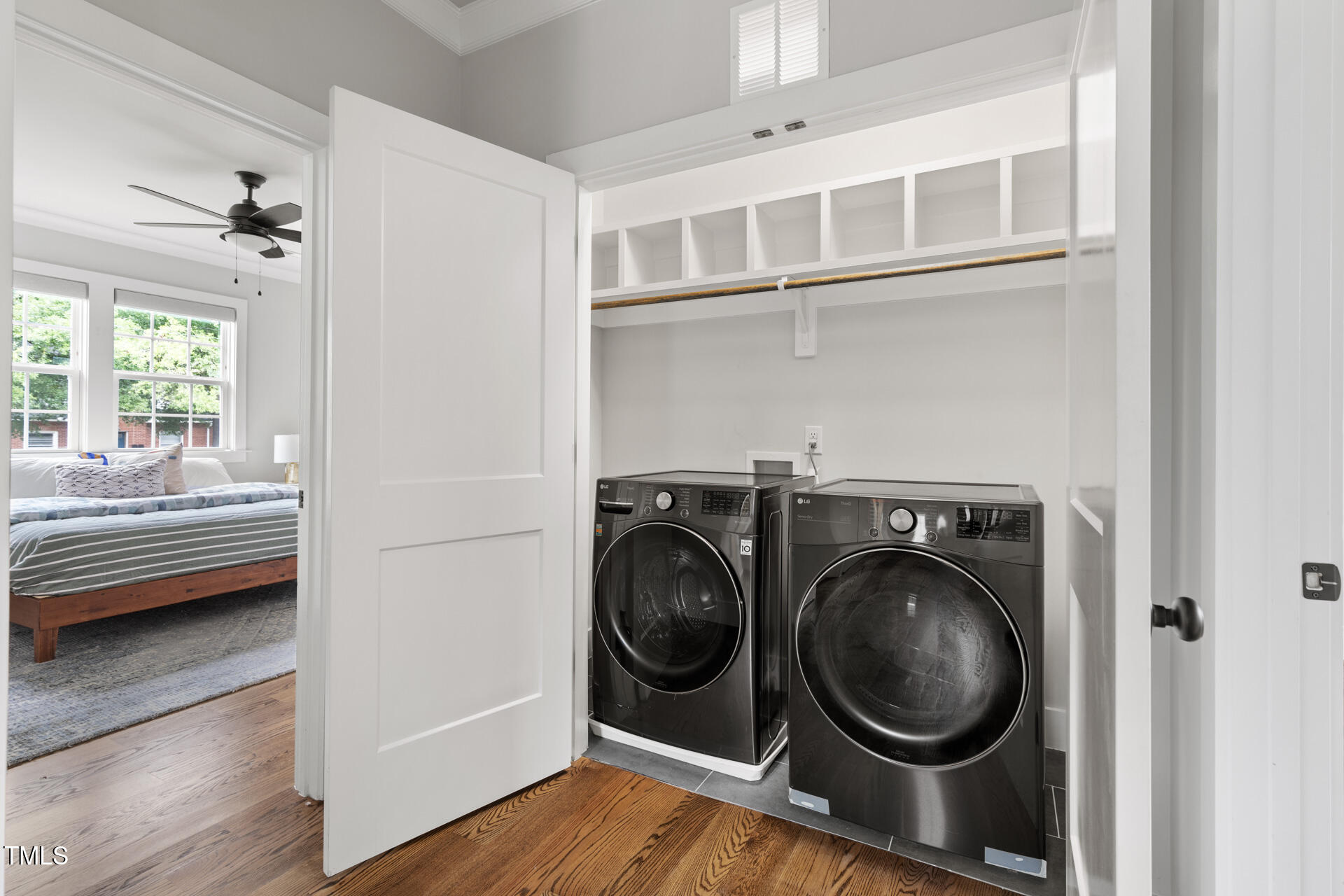2929 Chapel Hill Road Durham, NC 27707 - Photo 30 of 38 a view of a bedroom with washer and dryer