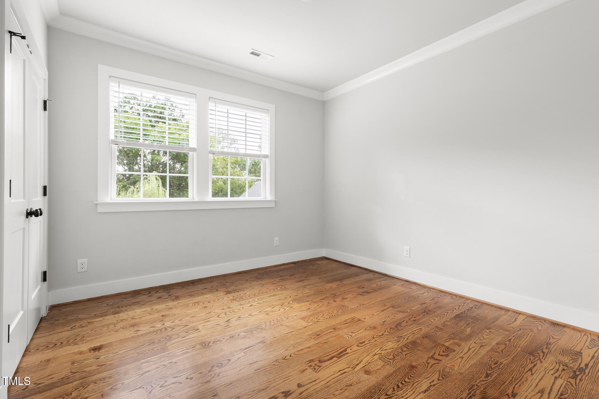2929 Chapel Hill Road Durham, NC 27707 - Photo 31 of 38 an empty room with a window