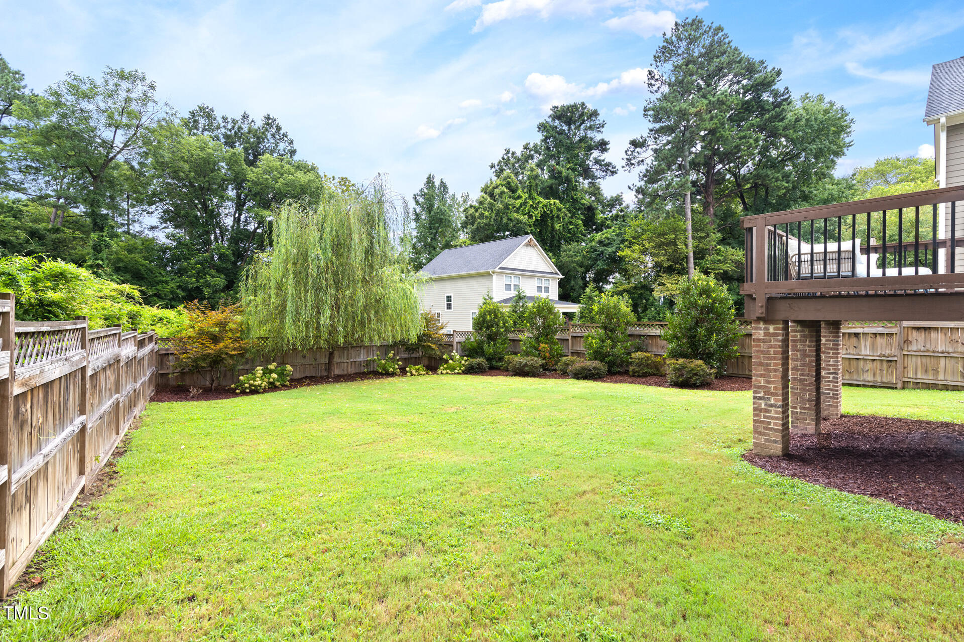 2929 Chapel Hill Road Durham, NC 27707 - Photo 37 of 38 a view of a house with backyard and trees