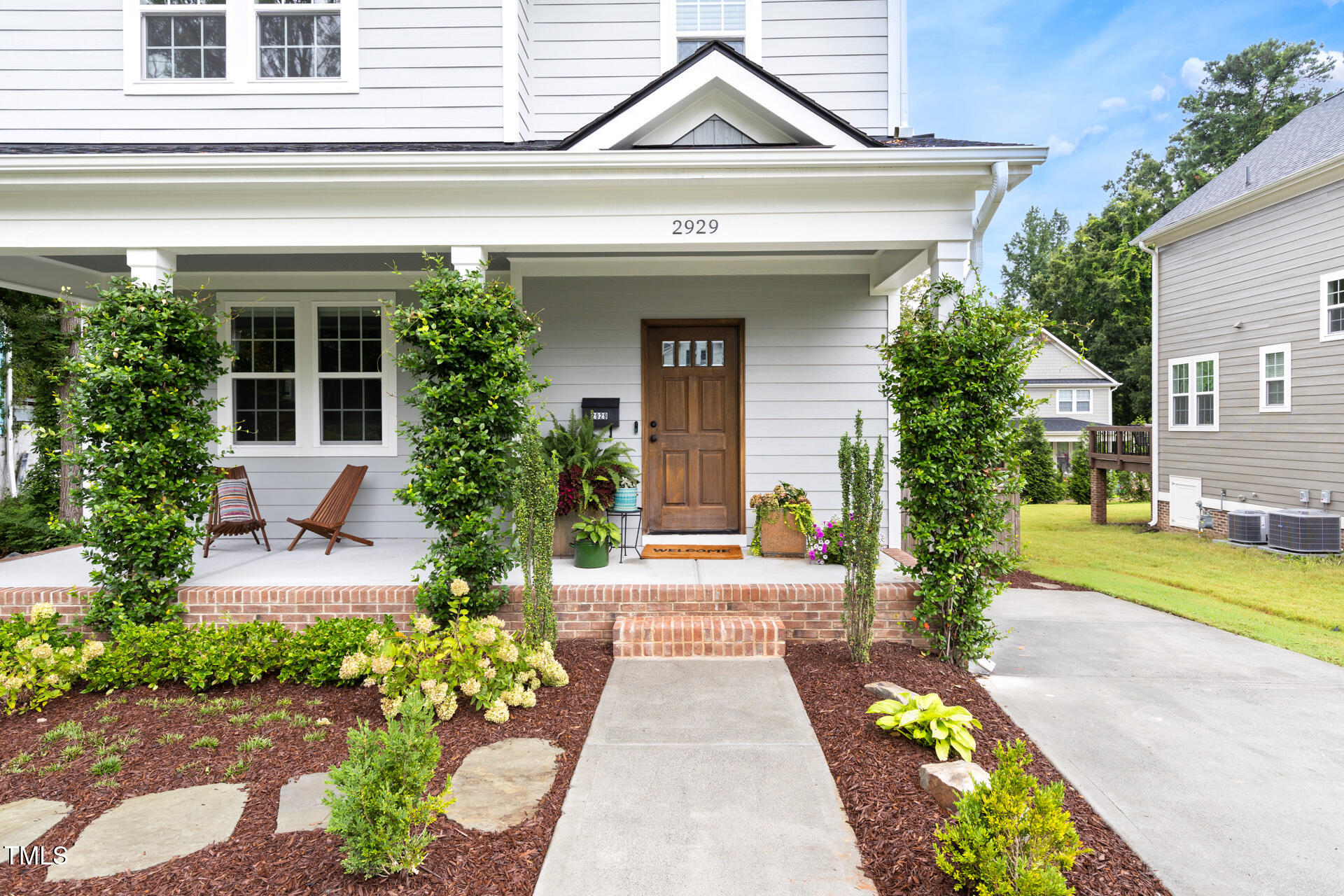 2929 Chapel Hill Road Durham, NC 27707 - Photo 4 of 38 front view of a house with a yard