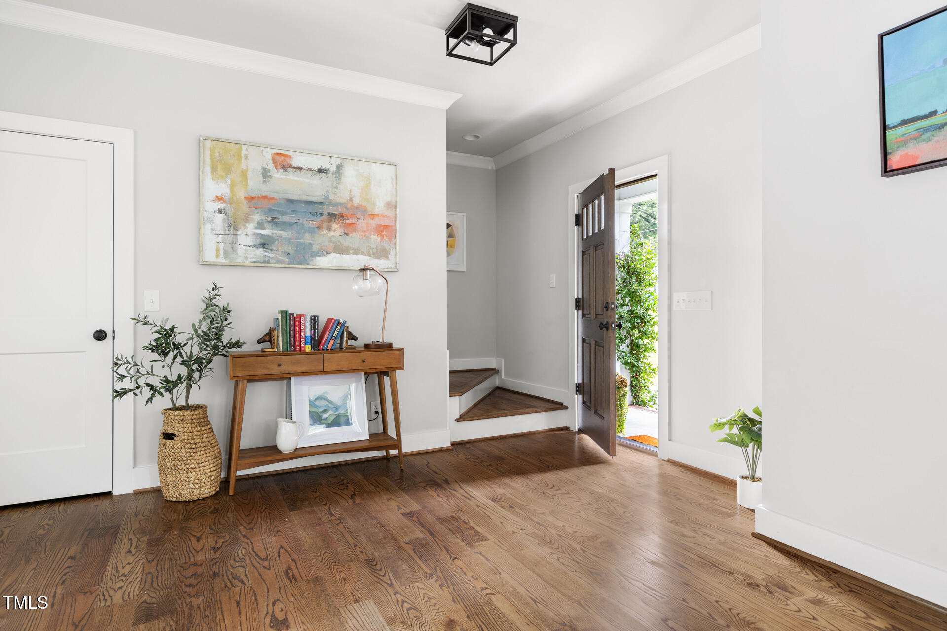 2929 Chapel Hill Road Durham, NC 27707 - Photo 6 of 38 a view of an empty room with a window and wooden floor