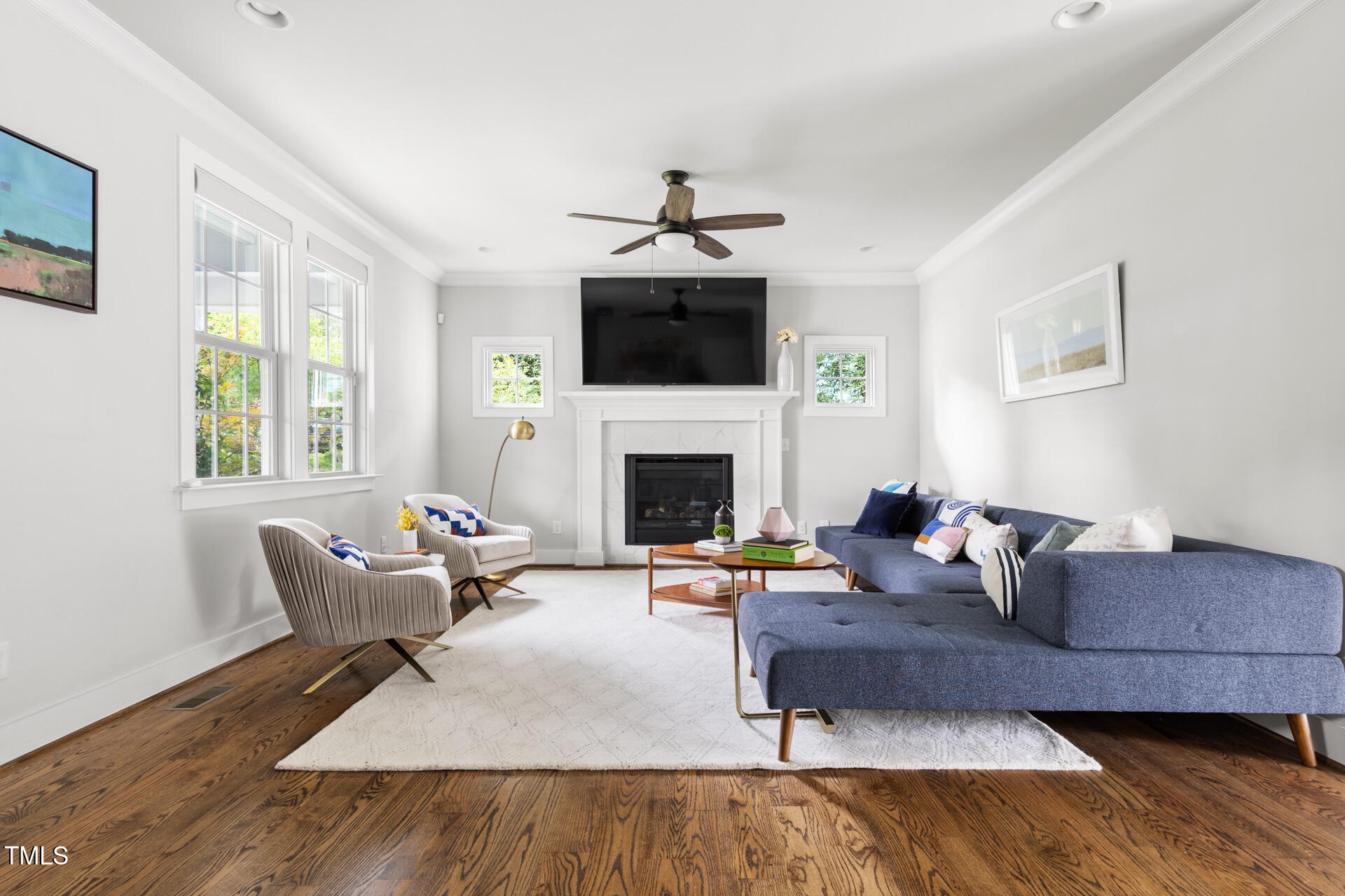 2929 Chapel Hill Road Durham, NC 27707 - Photo 8 of 38 a living room with furniture and a fireplace