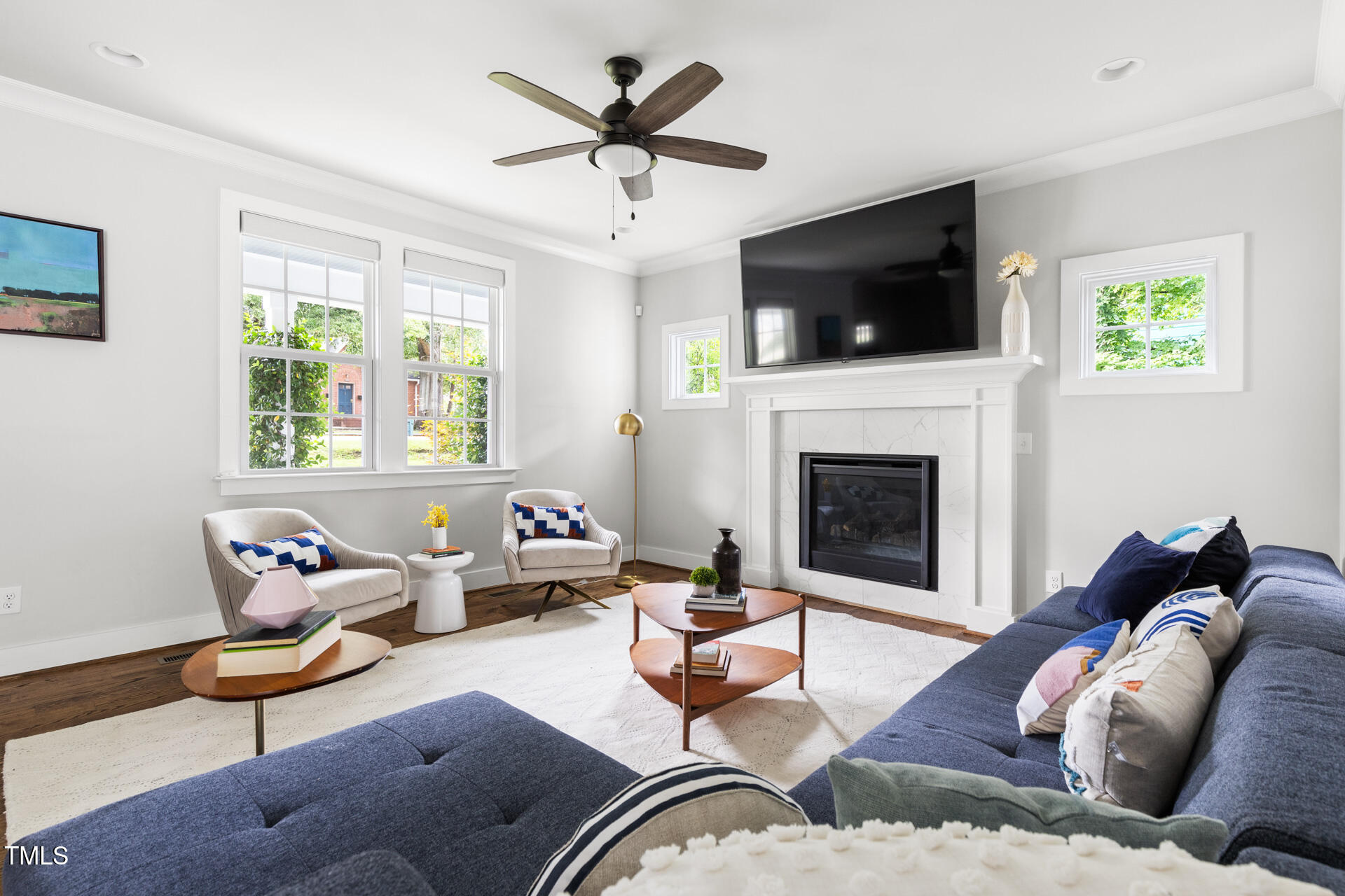 2929 Chapel Hill Road Durham, NC 27707 - Photo 9 of 38 a living room with furniture fireplace and flat screen tv