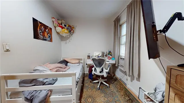 a view of workspace with baby crib