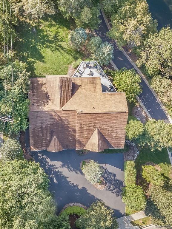 26900 Drake Road Farmington, MI 48331 - Photo 42 of 46 The historic, centuries old pump house is in the backyard, with an active brook