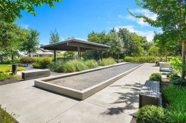 a outdoor living space with furniture and a potted plant