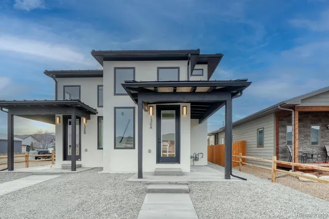 a house view with a outdoor space