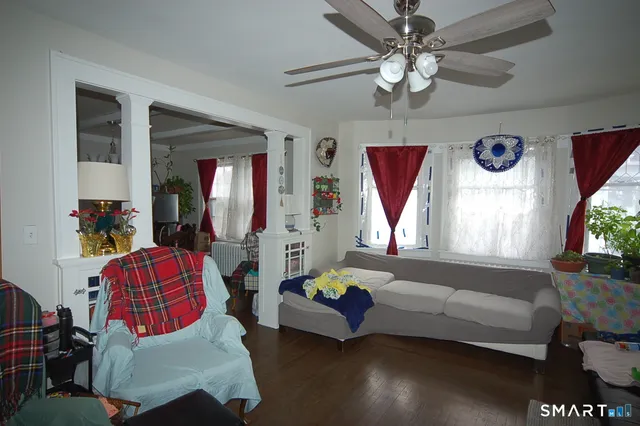 a living room with furniture and a window