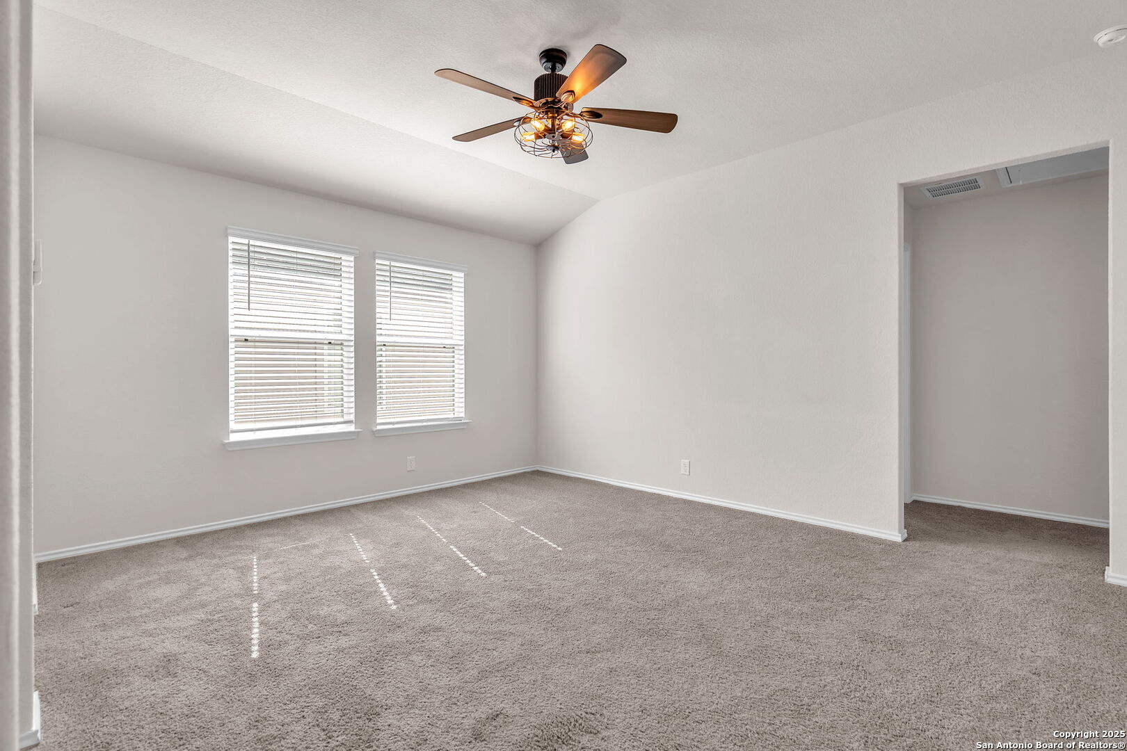105 Honors Street Floresville, TX 78114 - Photo 27 of 36 a view of an empty room with a window