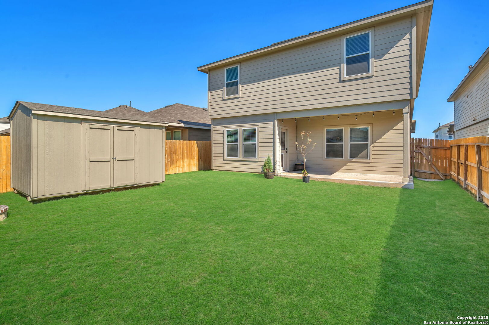 105 Honors Street Floresville, TX 78114 - Photo 36 of 36 front view of a house with a yard
