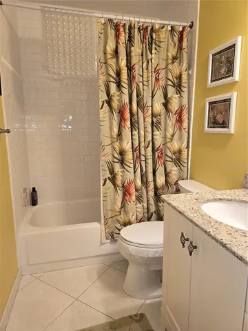 a view of a small space with wooden floor