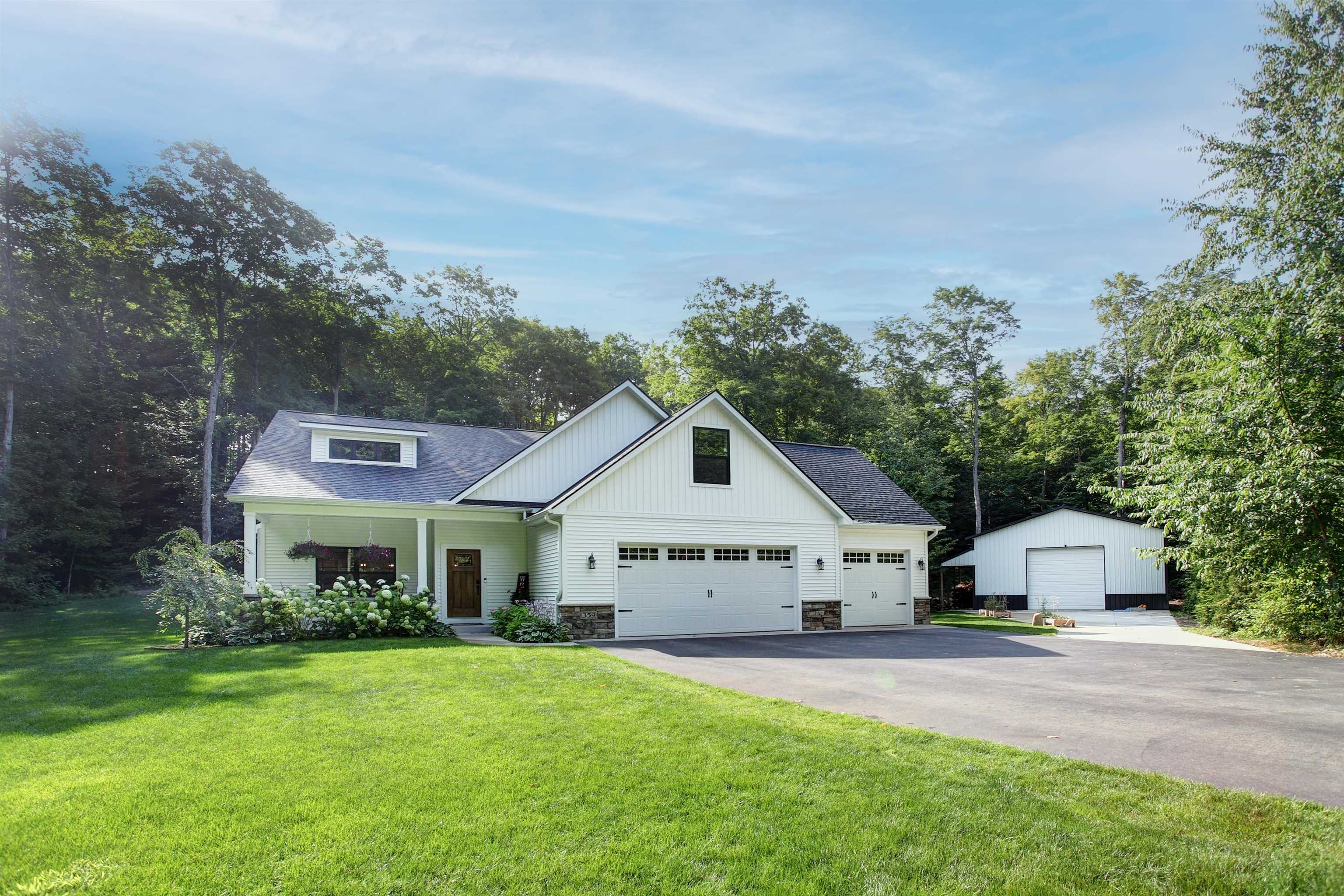359 West Valley Road Maple City, MI 49664 - Photo 1 of 46