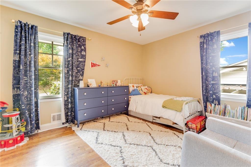 2357 Cortez Way Northeast Brookhaven, GA 30319 - Photo 20 of 32 a bedroom with a bed and a window