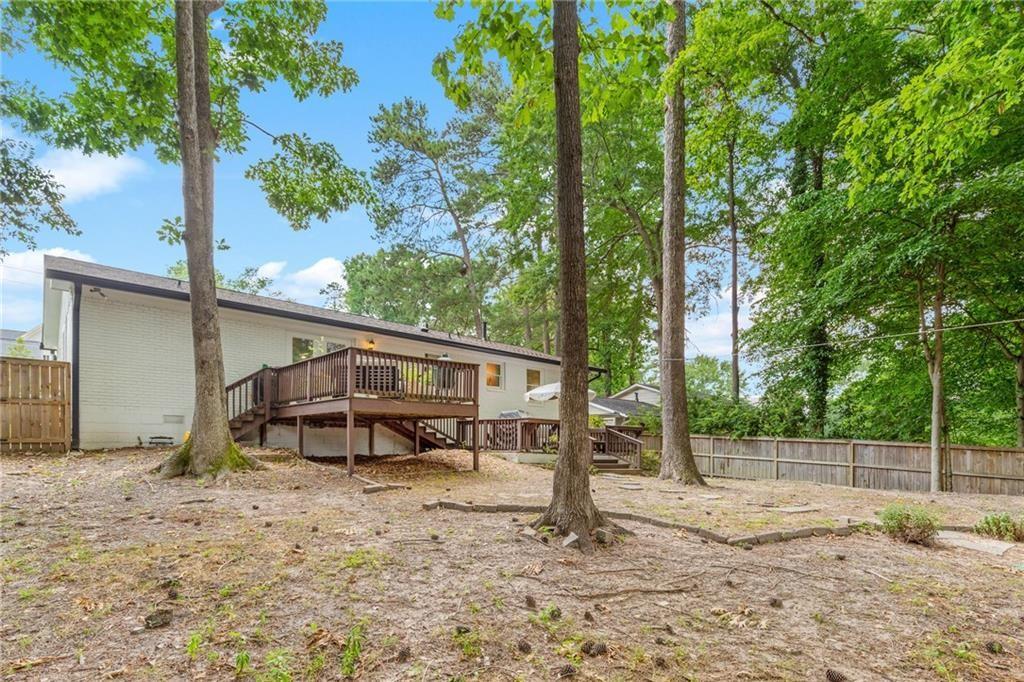2357 Cortez Way Northeast Brookhaven, GA 30319 - Photo 29 of 32 a view of a house with backyard and a tree