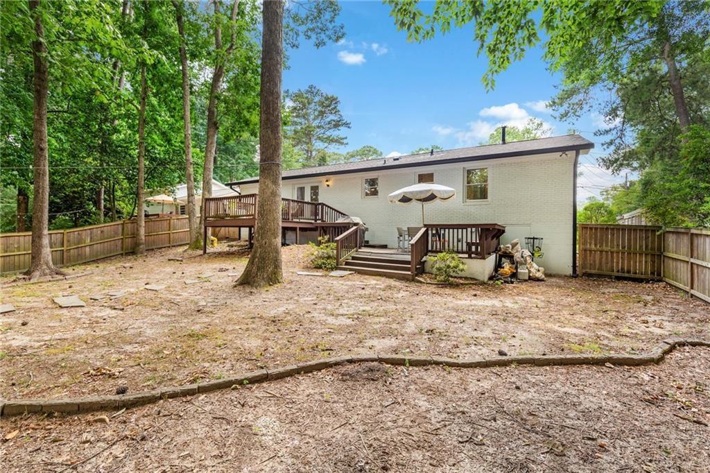 2357 Cortez Way Northeast Brookhaven, GA 30319 - Photo 31 of 32 a view of a yard with wooden fence