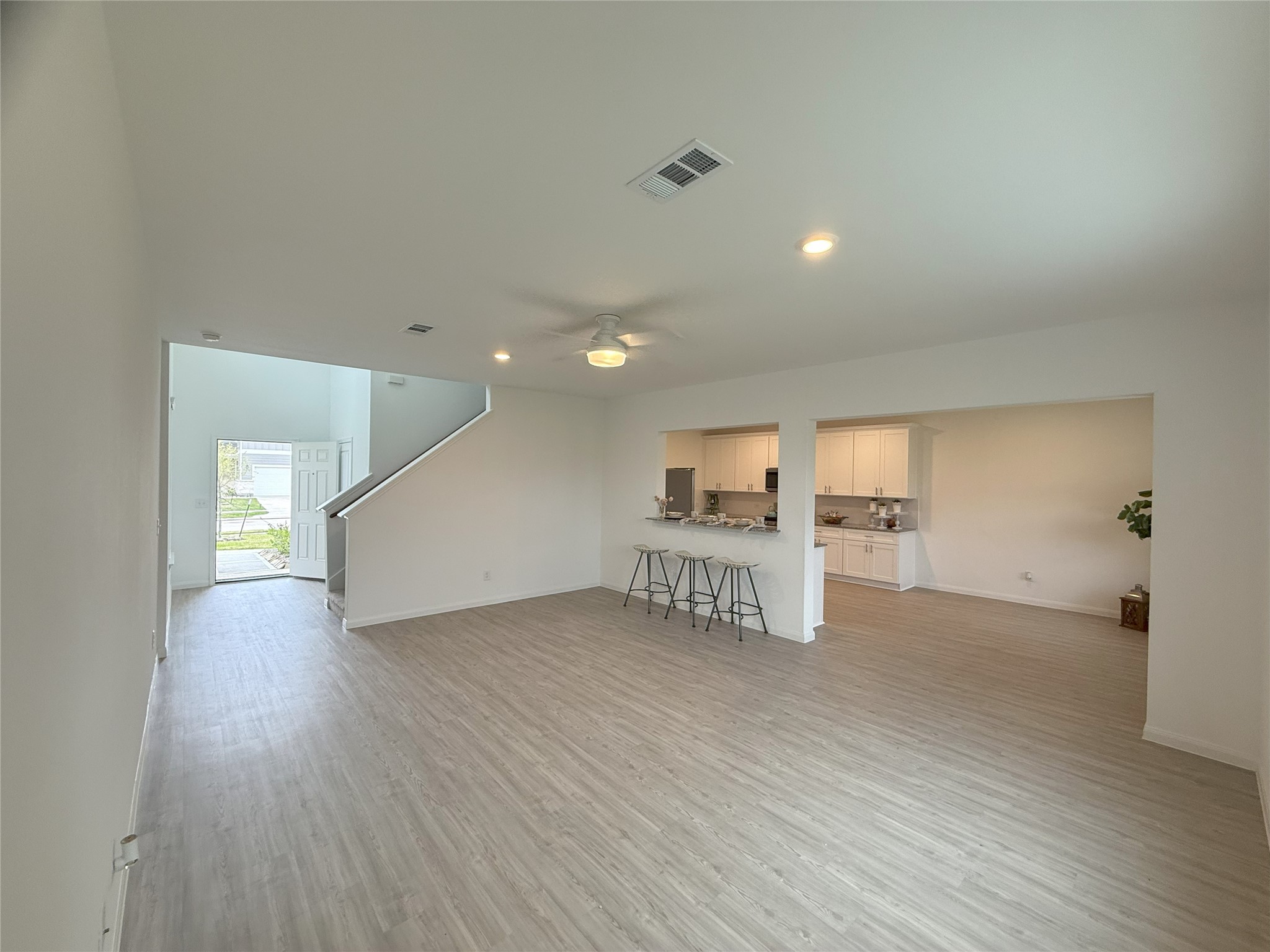 23406 Wagon Cart Road Hockley, TX 77447 - Photo 5 of 47 a view of empty room with wooden floor