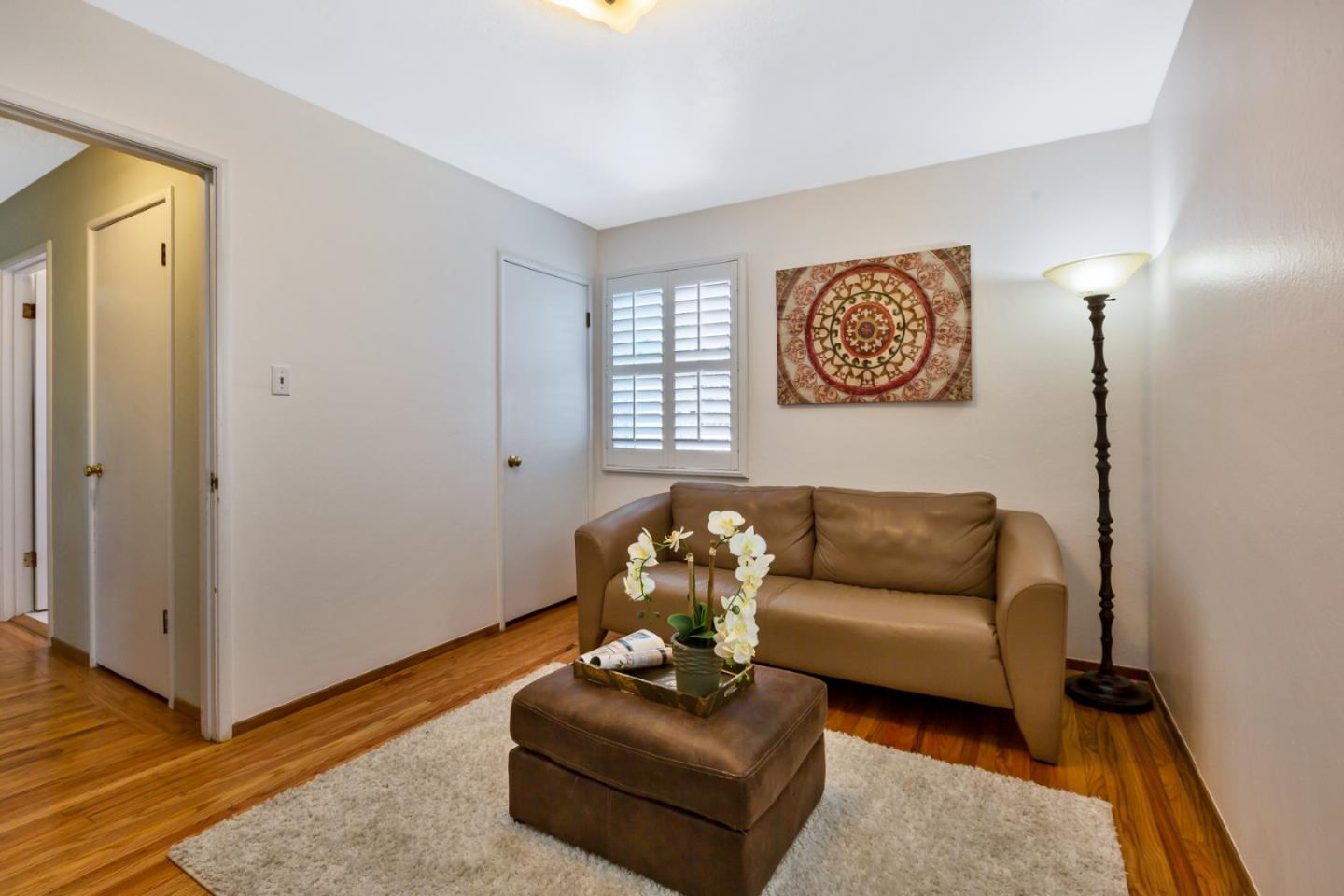 16 North Rochester Street San Mateo, CA 94401 - Photo 12 of 27 a living room with furniture and a window