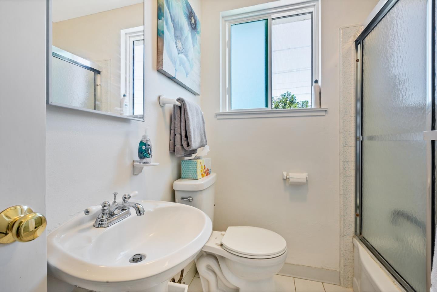 16 North Rochester Street San Mateo, CA 94401 - Photo 15 of 27 a bathroom with a sink a toilet and a mirror