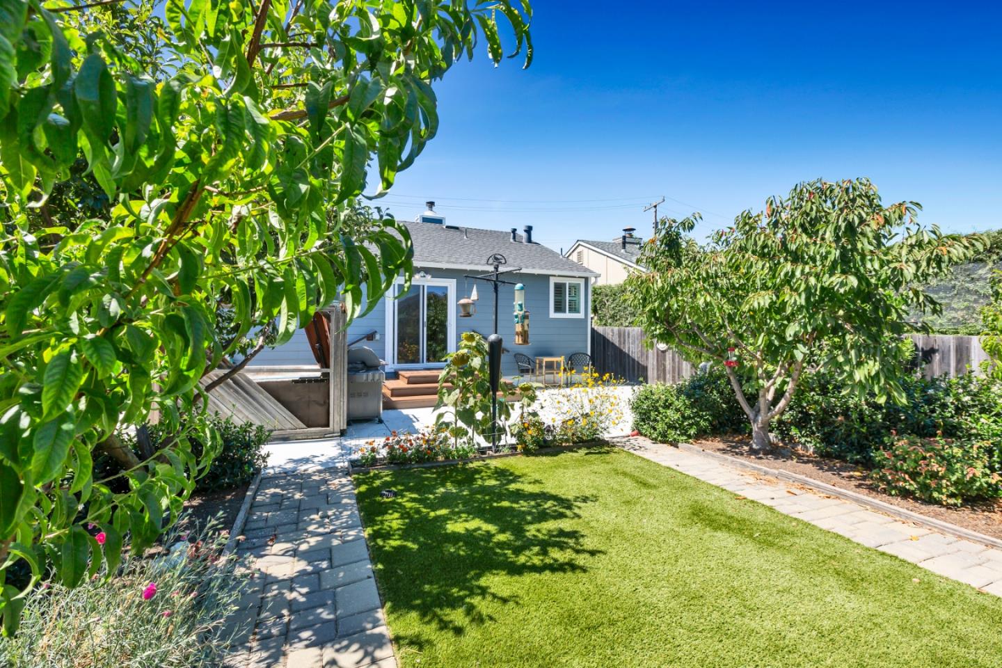 16 North Rochester Street San Mateo, CA 94401 - Photo 22 of 27 a front view of a house with a yard