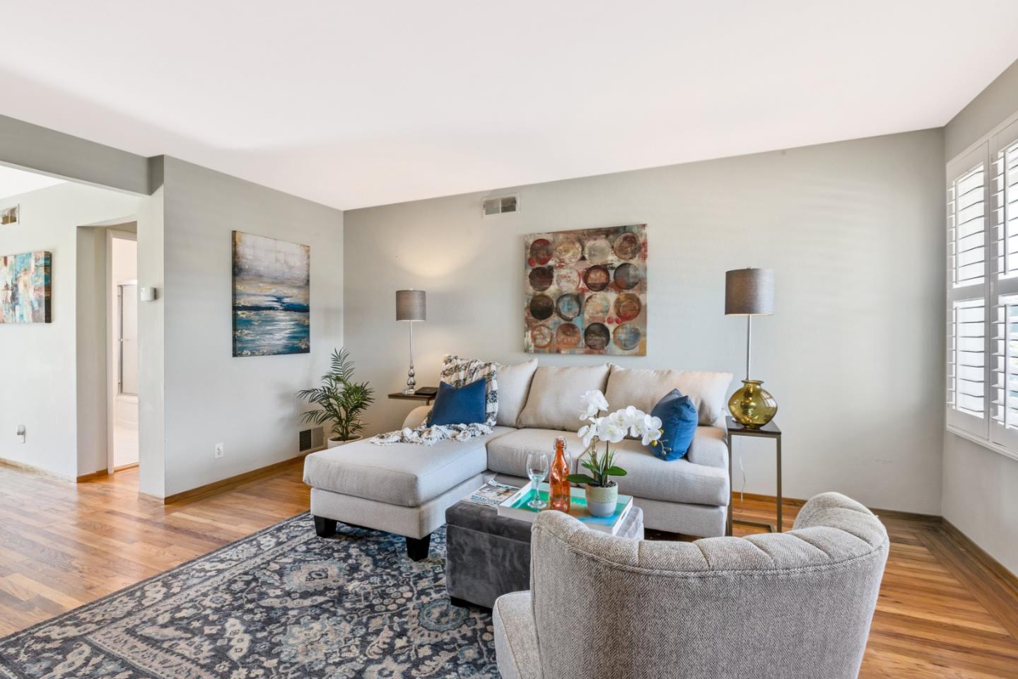 16 North Rochester Street San Mateo, CA 94401 - Photo 7 of 27 a living room with furniture and wooden floor