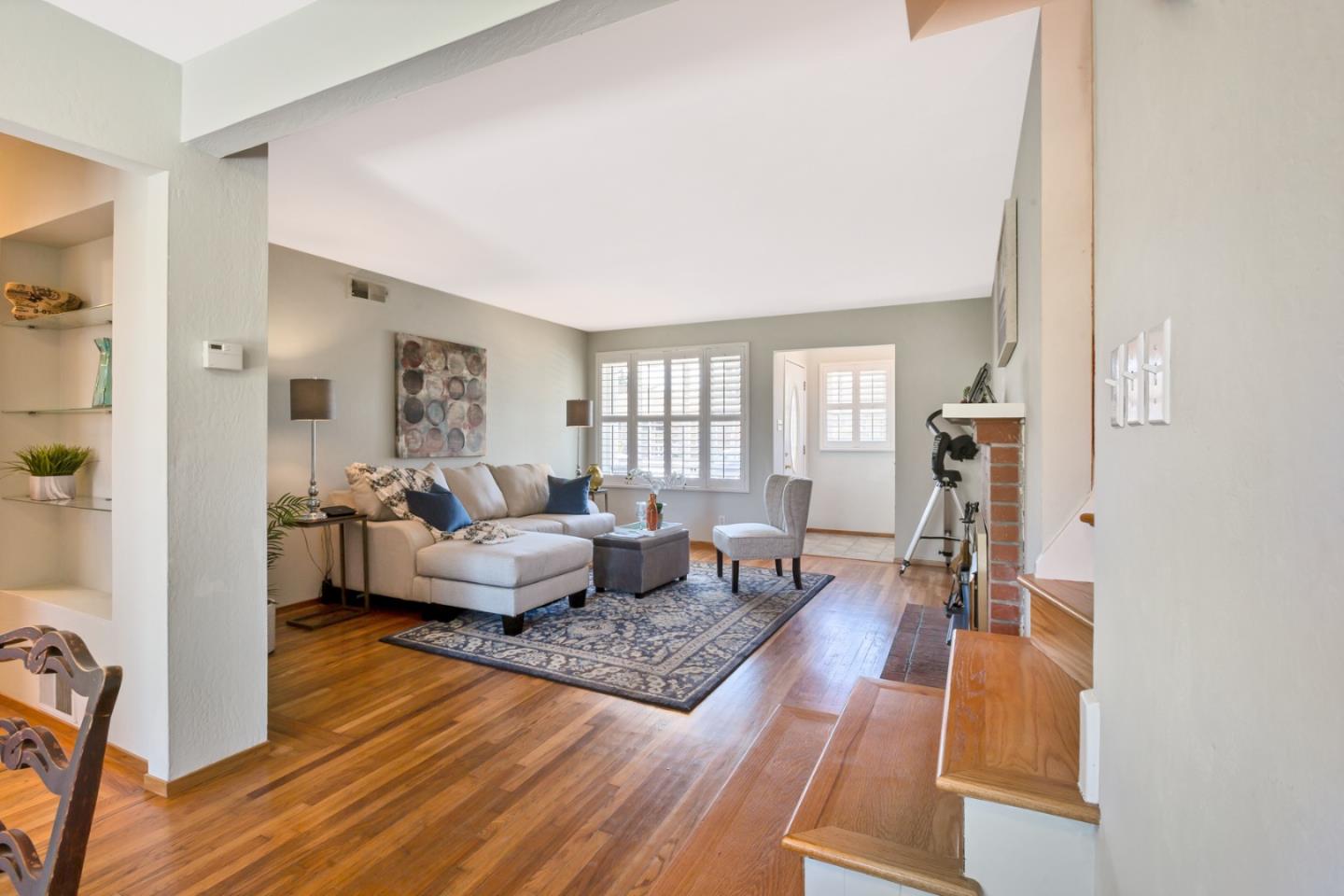 16 North Rochester Street San Mateo, CA 94401 - Photo 10 of 27 a living room with furniture and a wooden floor