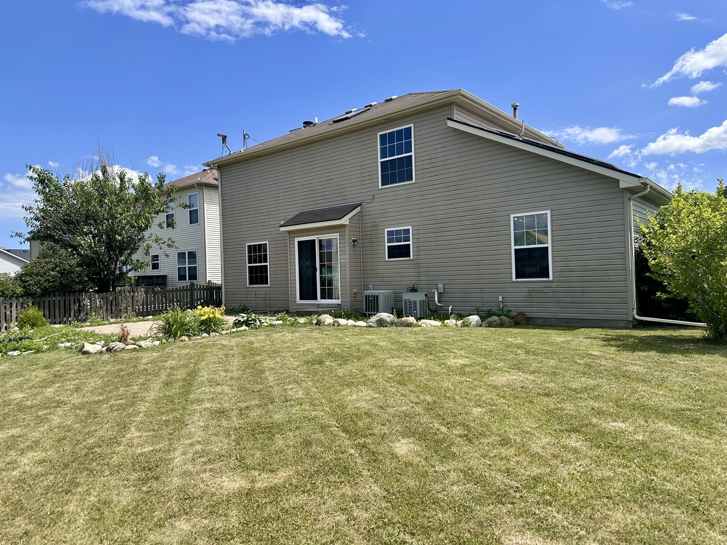 811 Water Stone Way Malta, IL 60150 - Photo 26 of 27 a house view with a backyard space