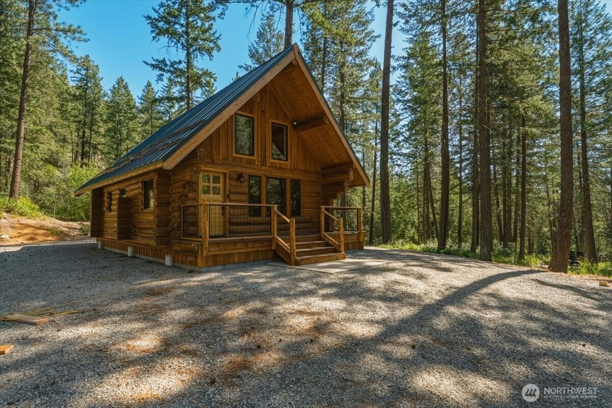 2350 First Crk Road Chelan, WA 98816 - Photo 1 of 39 a view of a house with a yard