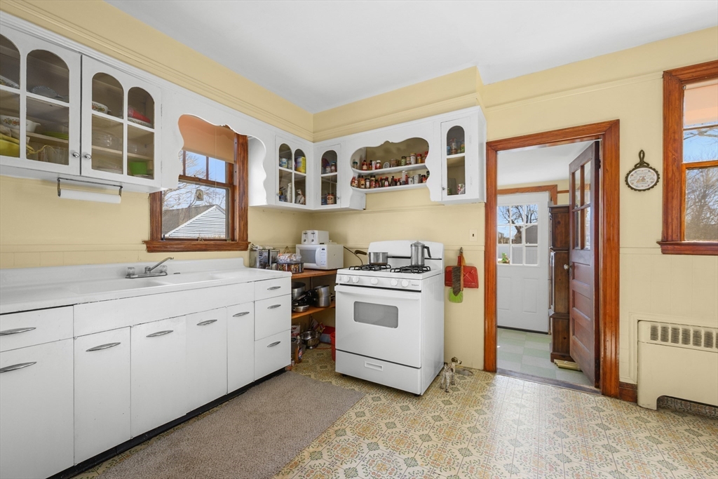65 Louis Street Barnstable, MA 02601 - Photo 14 of 37 a kitchen that has a sink and a stove