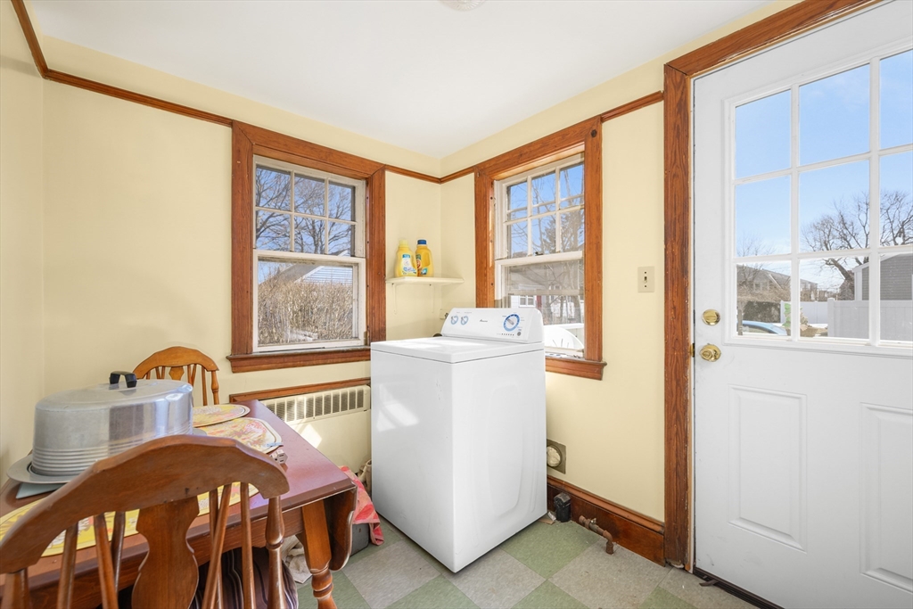 65 Louis Street Barnstable, MA 02601 - Photo 15 of 37 a bedroom with a bed and a dresser next to a window