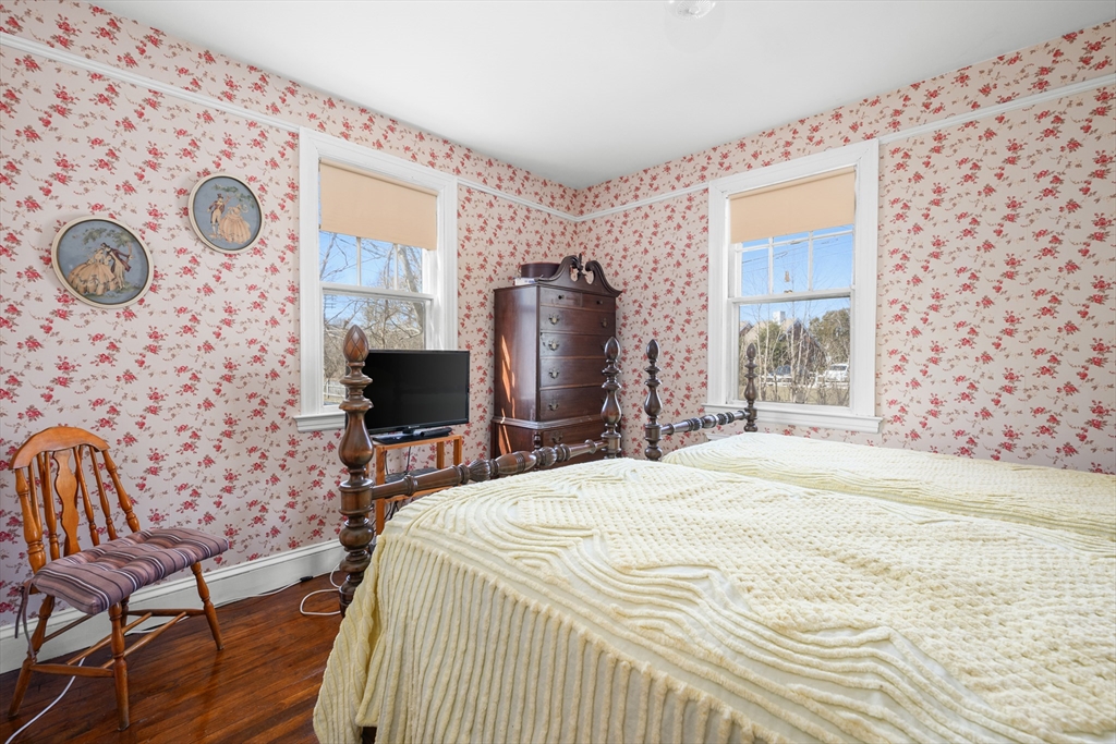 65 Louis Street Barnstable, MA 02601 - Photo 17 of 37 a bedroom with a bed chair and a window