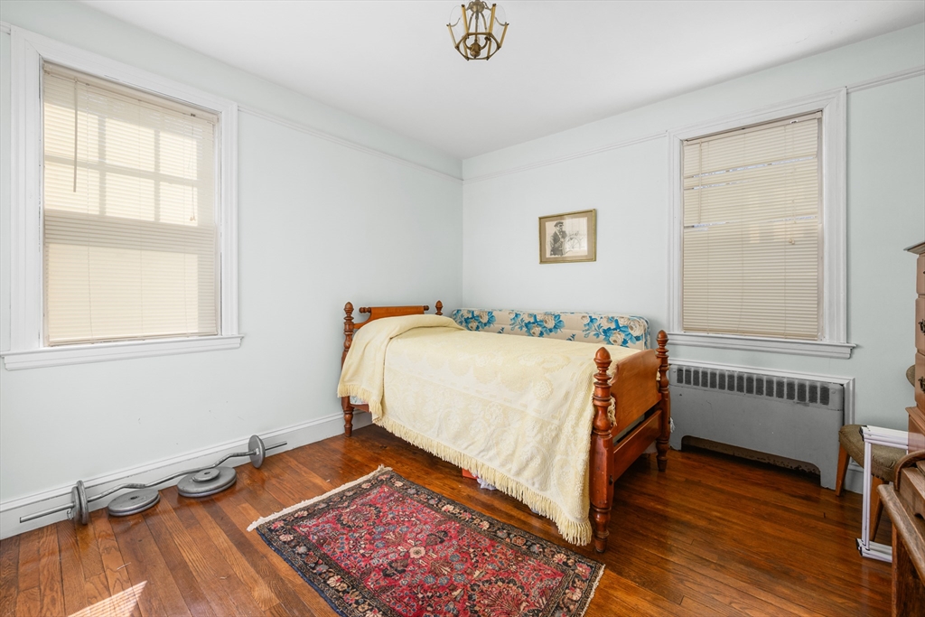 65 Louis Street Barnstable, MA 02601 - Photo 20 of 37 a bed room with a bed and a window