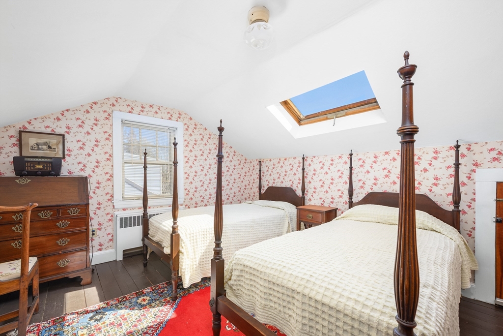 65 Louis Street Barnstable, MA 02601 - Photo 24 of 37 a bedroom with two beds and a dresser
