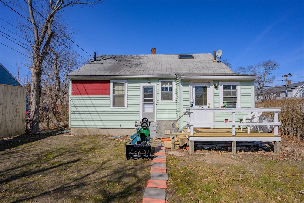 65 Louis Street Barnstable, MA 02601 - Photo 30 of 37 a view of house with backyard outdoor seating area and furniture