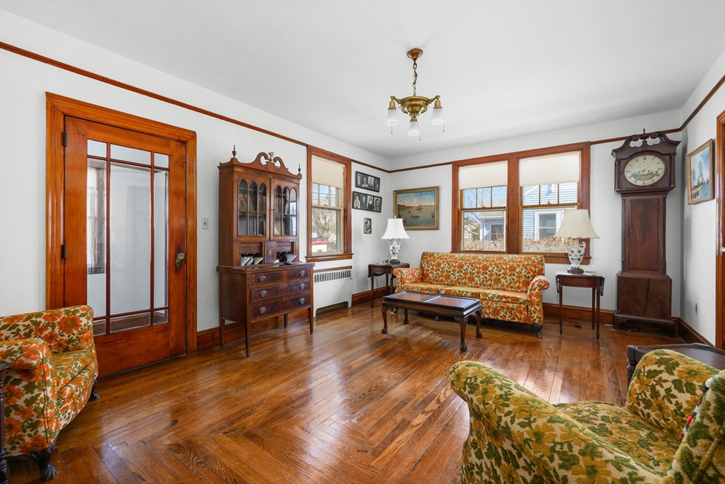 65 Louis Street Barnstable, MA 02601 - Photo 3 of 37 a living room with furniture and a large window