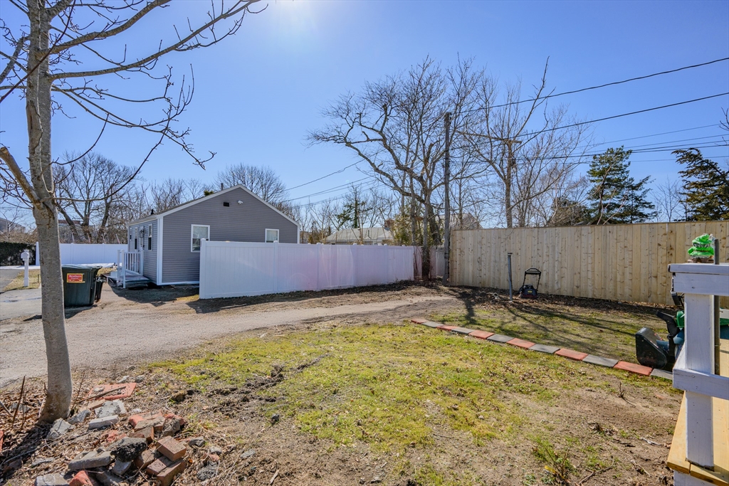 65 Louis Street Barnstable, MA 02601 - Photo 32 of 37 a backyard of a house
