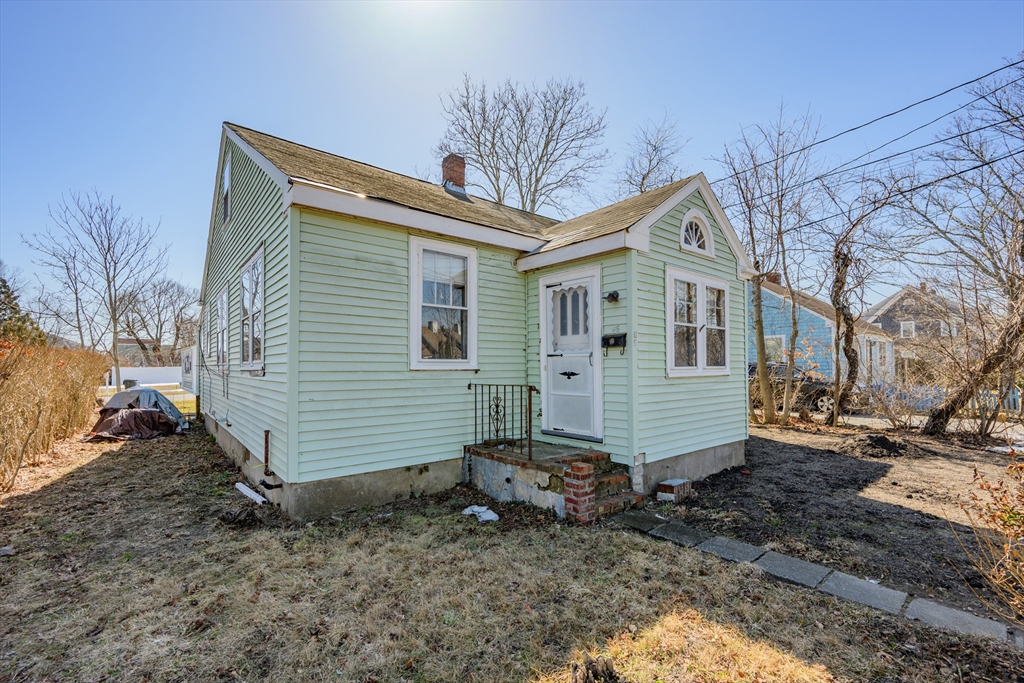 65 Louis Street Barnstable, MA 02601 - Photo 33 of 37 a view of a house with a yard