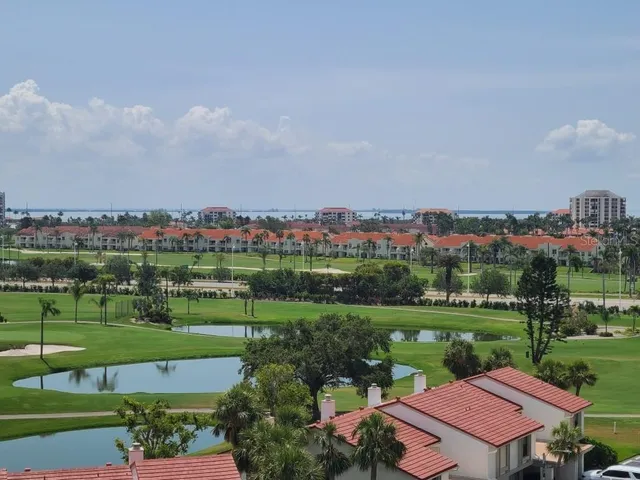 a bedroom with a bed and a night stand