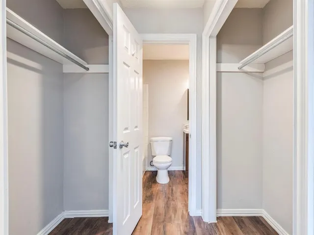 a view of a bathroom from a hallway