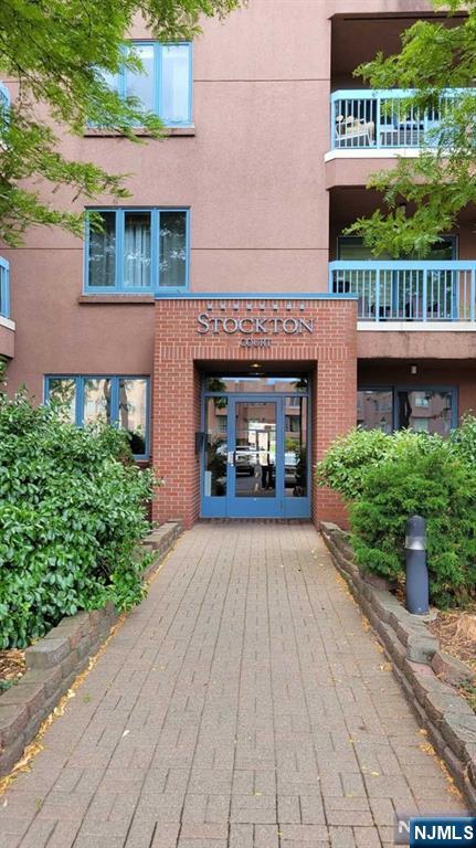 front view of a house with a street