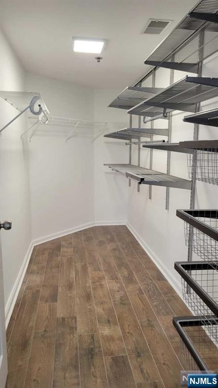 302 Stockton Court Edgewater, NJ 07020 - Photo 8 of 15 a view of a room with racks on the wall