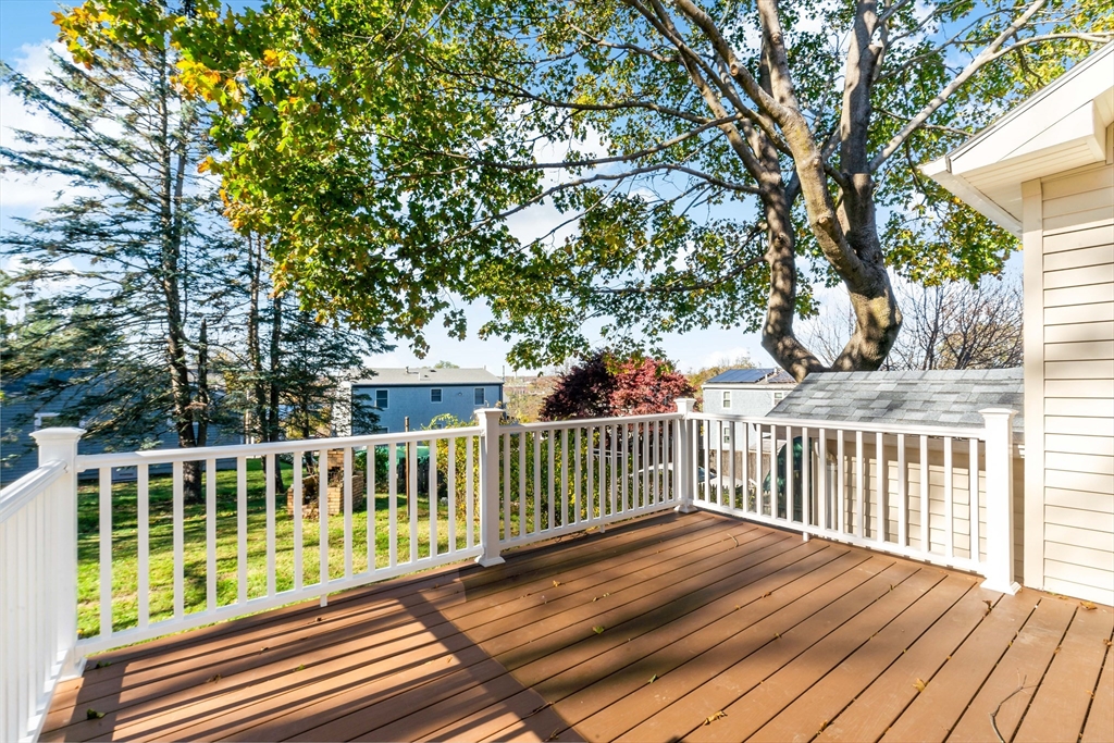 172 Gibbs Street Fall River, MA 02720 - Photo 4 of 29 a view of a wooden roof deck