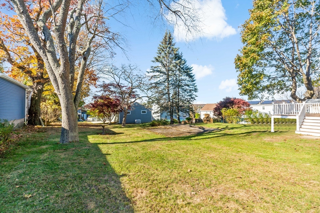 172 Gibbs Street Fall River, MA 02720 - Photo 5 of 29 a view of a swimming pool with an outdoor space and seating area