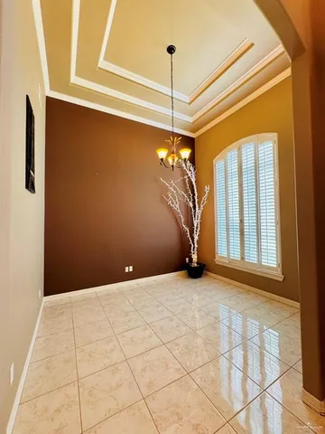 a view of a livingroom with a ceiling fan and window