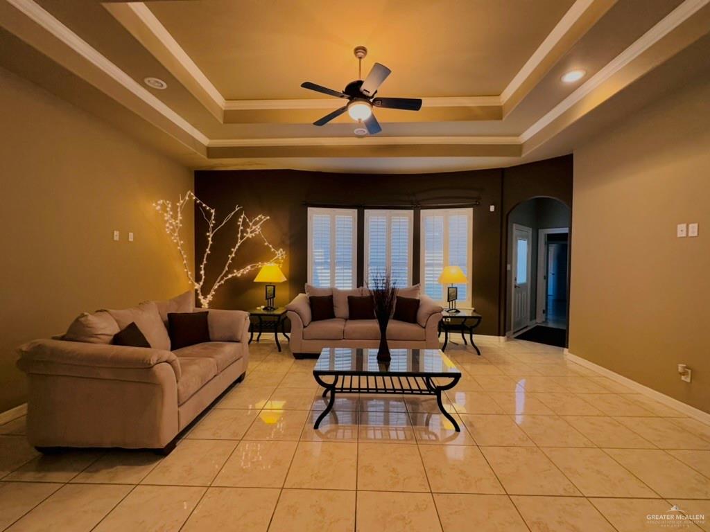 201 Thornwood Loop Rio Grande City, TX 78582 - Photo 10 of 25 a living room with furniture and a large window